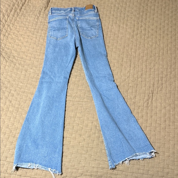 American Eagle Outfitters Light Blue Distressed Flare Jeans - Picture 3 of 3